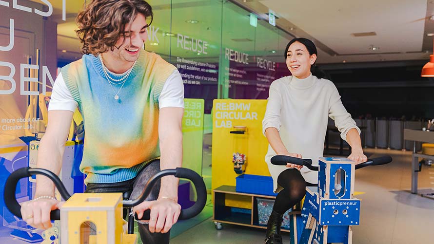 RE:BMW CIRCULAR LAB for 13 to 15 year olds Young people on recycle pedal bikes in the BMW CIRCULAR LAB