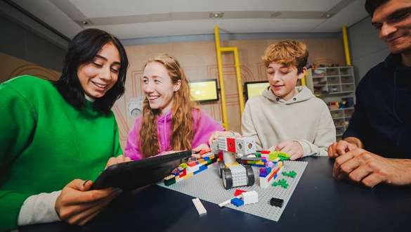 BMW Welt Families and Children Workshop participants create a Lego model together in a workshop at BMW Welt