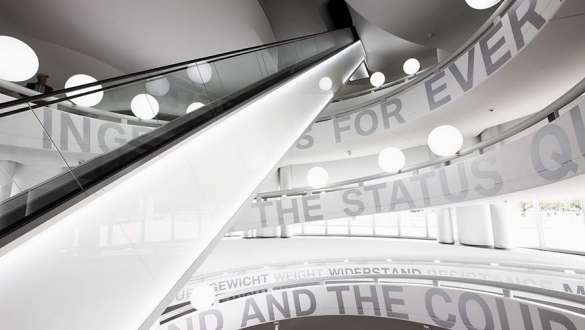 New architectural perspectives at the BMW Museum Escalator through the round building of the BMS Museum
